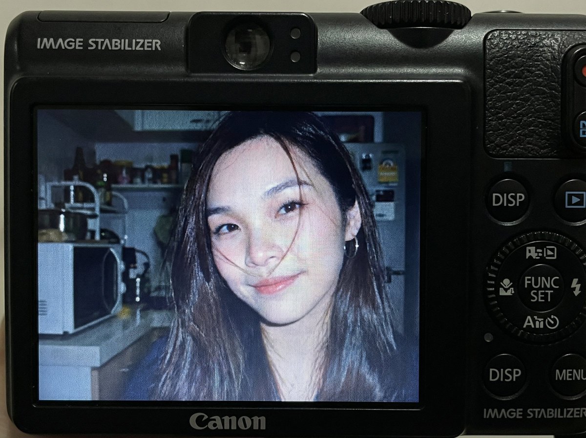 Compact Digital Camera Screen Snapshot of a Young Woman