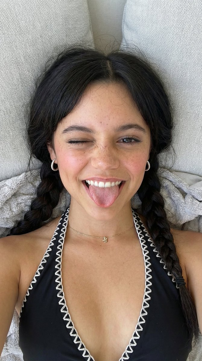 Playful Overhead Portrait with Winking Expression Prompt (Black Hair) 3