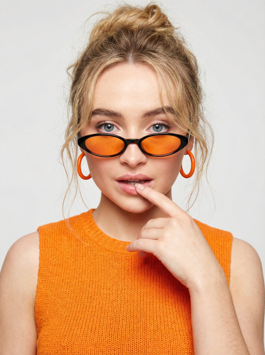 High-fashion editorial portrait with vivid orange accents 4