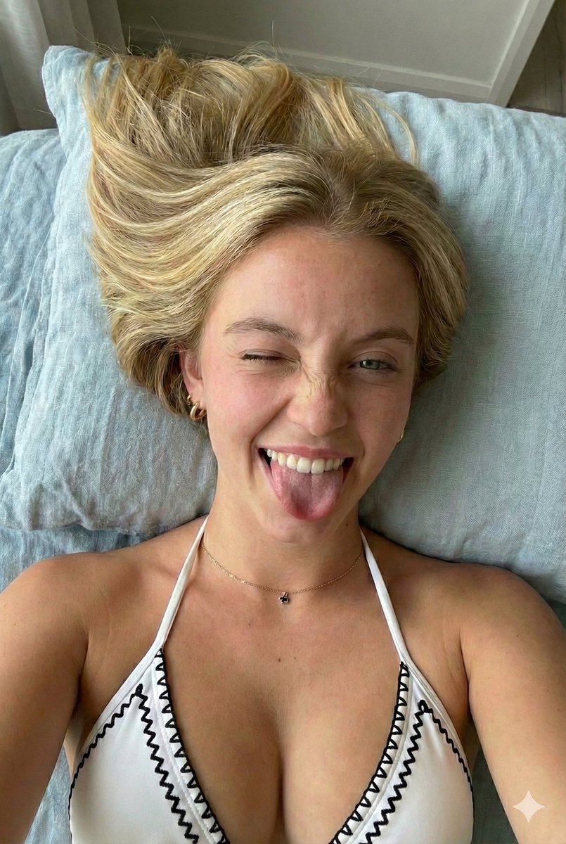 Close-up Portrait of a Playful Young Woman Lying Down 3