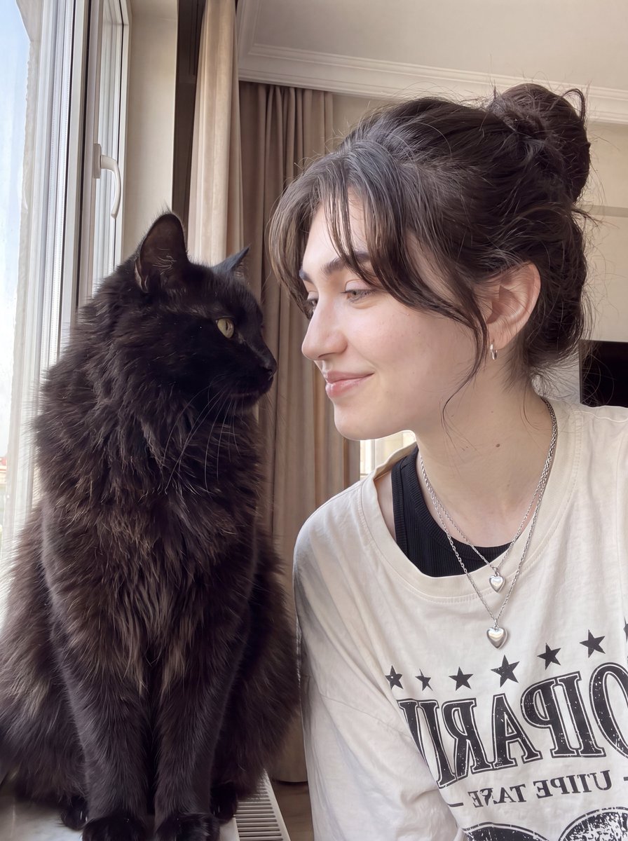 Woman with Fluffy Black Cat Portrait 2